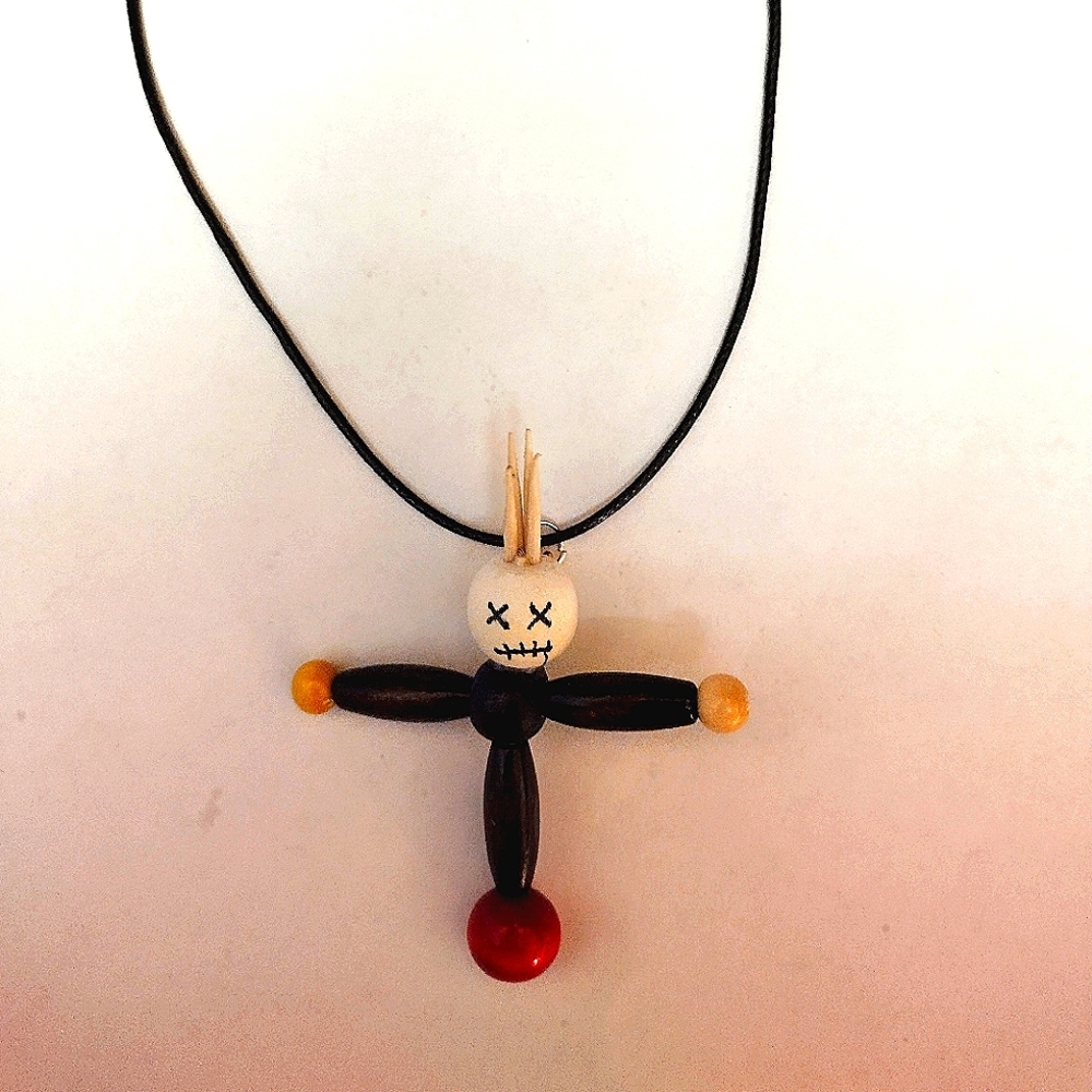 Wood bead voodoo doll